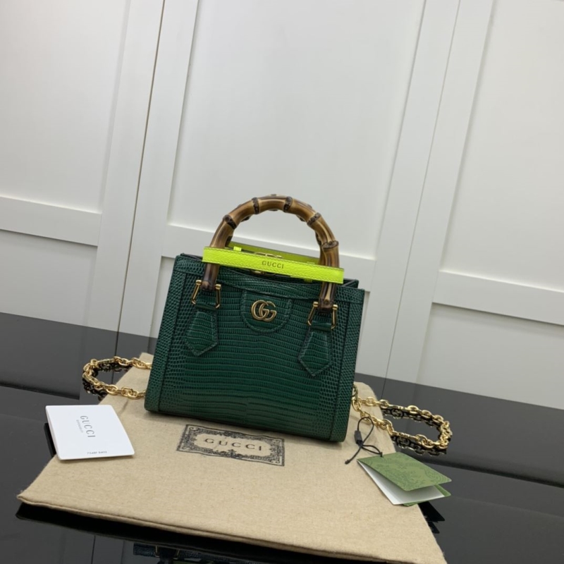 G*u*i top handle bags